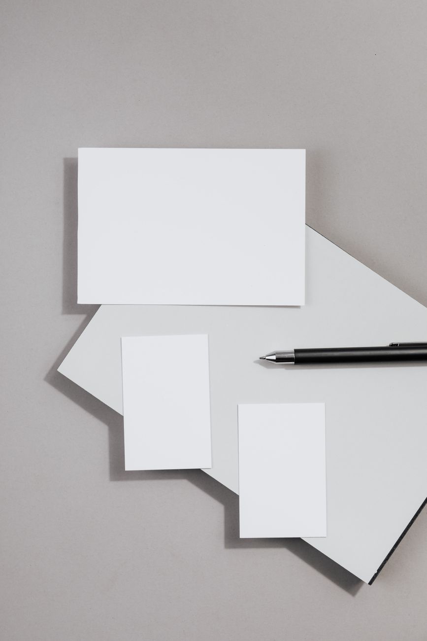 paper sheets and pen