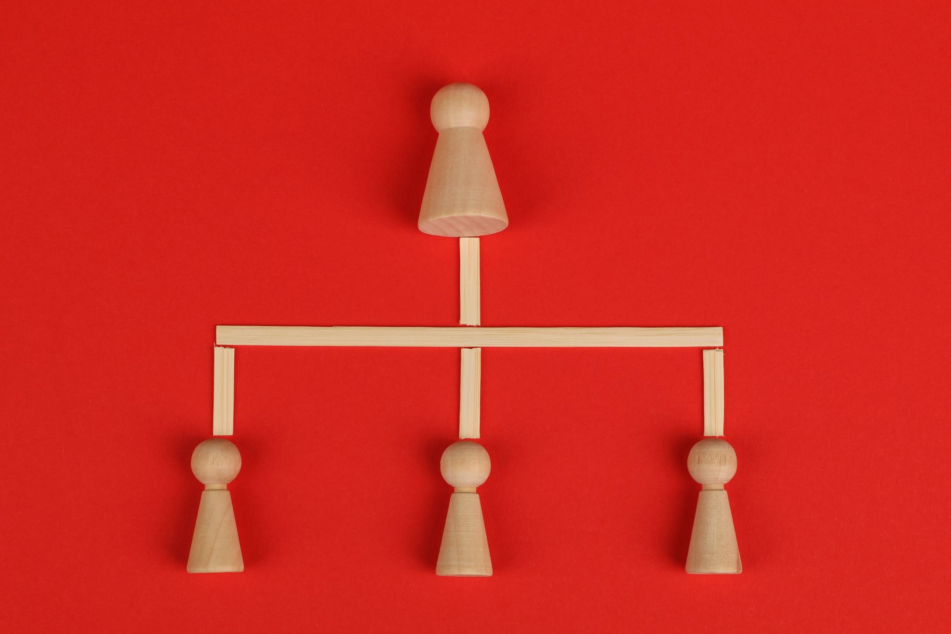 pawns connected with wooden sticks